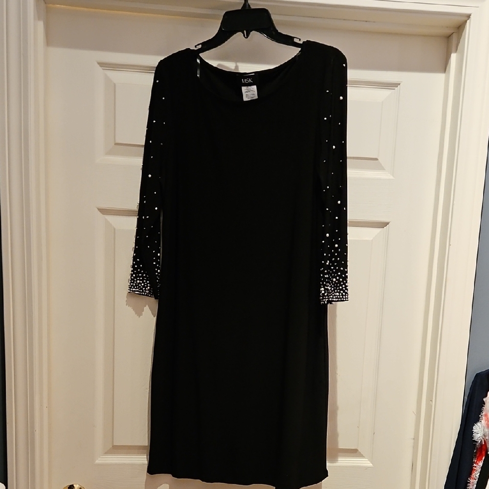 Elegant Black Dress with Embellished Sleeves